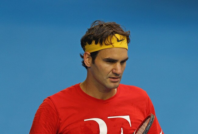 MELBOURNE, AUSTRALIA - JANUARY 12:  Roger Federer of Switzerland looks on during a practice session ahead of the 2011 Australian Open at Melbourne Park on January 12, 2011 in Melbourne, Australia.  (Photo by Scott Barbour/Getty Images)