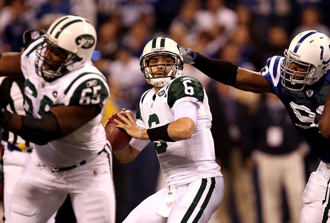 INDIANAPOLIS, IN - JANUARY 08:  Quarterback Mark Sanchez #6 of the New York Jets looks to pass the ball against the Indianapolis Colts during their 2011 AFC wild card playoff game at Lucas Oil Stadium on January 8, 2011 in Indianapolis, Indiana. The Jets won 17-16. (Photo by Jonathan Daniel/Getty Images)