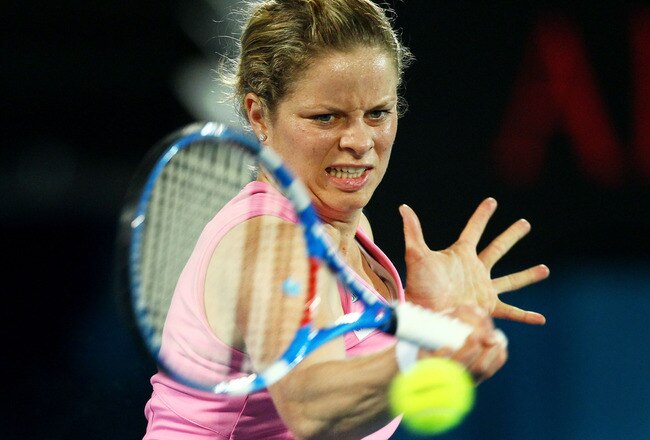 SYDNEY, AUSTRALIA - JANUARY 14: Kim Clijsters of Belgium plays a forehand in the womens final against Na Li of China during day six of the 2011 Medibank International at Sydney Olympic Park Tennis Centre on January 14, 2011 in Sydney, Australia.  (Photo by Mark Nolan/Getty Images)