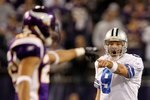 MINNEAPOLIS - JANUARY 17:  Tony Romo #9 of the Dallas Cowboys reacts during the game against the Minnesota Vikings during the NFC Divisional Playoff Game at Hubert H. Humphrey Metrodome on January 17, 2010 in Minneapolis, Minnesota. The Vikings defeated the Cowboys 34-3.  (Photo by Chris McGrath/Getty Images)