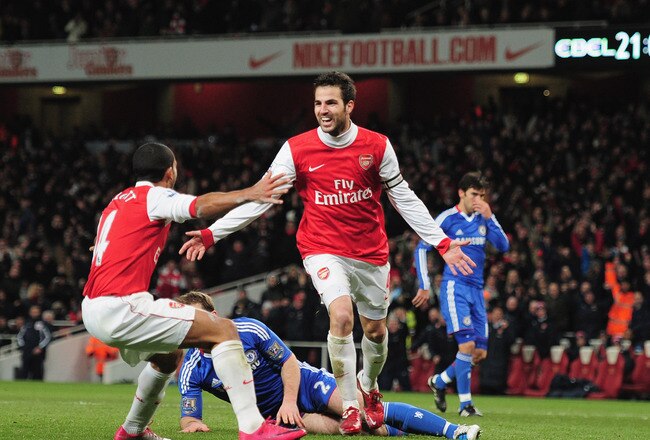 LONDON, ENGLAND - DECEMBER 27:  Cesc Fabregas of Arsenal celebrates Arsenal's second goal with Theo Walcott (L) during the Barclays Premier League match between Arsenal and Chelsea at the Emirates Stadium on December 27, 2010 in London, England.  (Photo by Shaun Botterill/Getty Images)