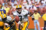 ANAHEIM, CA - SEPTEMBER 24:  Quarterback Don Majkowski #7 of the Green Bay Packers looks to pass during the game against the Los Angeles Rams at Anaheim Stadium on September 24, 1989 in Anaheim, California.  The Rams won 41-38.  (Photo by George Rose/Getty Images)