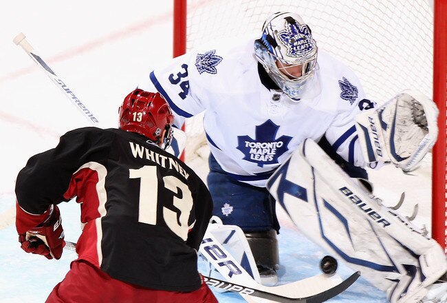 GLENDALE, AZ - JANUARY 13:  Ray Whitney #13 of the Phoenix Coyotes shoots the puck on goaltender James Reimer #34 of the Toronto Maple Leafs during the second period of the NHL game at Jobing.com Arena on January 13, 2011 in Glendale, Arizona.  (Photo by Christian Petersen/Getty Images)