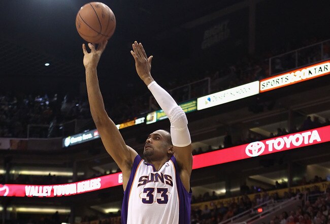 PHOENIX - DECEMBER 10:  Grant Hill #33 of the Phoenix Suns puts up a shot during the NBA game against the Portland Trail Blazers at US Airways Center on December 10, 2010 in Phoenix, Arizona. The Trail Blazers defeated the Suns 101-94.  NOTE TO USER: User expressly acknowledges and agrees that, by downloading and or using this photograph, User is consenting to the terms and conditions of the Getty Images License Agreement.  (Photo by Christian Petersen/Getty Images)