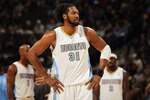 DENVER - DECEMBER 28:  Nene #31 of the Denver Nuggets looks on during a break in the action against the Portland Trail Blazers at Pepsi Center on December 28, 2010 in Denver, Colorado. The Nuggets defeated the Blazers 95-77. NOTE TO USER: User expressly acknowledges and agrees that, by downloading and or using this photograph, User is consenting to the terms and conditions of the Getty Images License Agreement.  (Photo by Doug Pensinger/Getty Images)