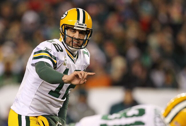 PHILADELPHIA, PA - JANUARY 09:  Aaron Rodgers #12 of the Green Bay Packers calls a play during their game against the Philadelphia Eagles during the 2011 NFC wild card playoff game at Lincoln Financial Field on January 9, 2011 in Philadelphia, Pennsylvania.  (Photo by Al Bello/Getty Images)