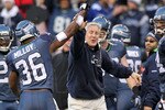 SEATTLE, WA - JANUARY 08: Head coach Pete Carroll and Lawyer Milloy #36 of the Seattle Seahawks celebrate a fourth down stop by the Seahawks in the third quarter against the New Orleans Saints during the 2011 NFC wild-card playoff game at Qwest Field on January 8, 2011 in Seattle, Washington. (Photo by Jonathan Ferrey/Getty Images)