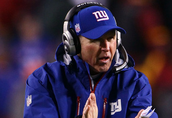 LANDOVER, MD - JANUARY 02:  Head coach Tom Coughlin of the New York Giants encourages his players in the fourth quarter against the Washington Redskins at FedEx Field on January 2, 2011 in Landover, Maryland. The Giants won the game 17-14.  (Photo by Win McNamee/Getty Images)