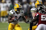 ATLANTA, GA - JANUARY 15:  James Starks #44 of the Green Bay Packers runs the ball against the Atlanta Falcons during their 2011 NFC divisional playoff game at Georgia Dome on January 15, 2011 in Atlanta, Georgia.  (Photo by Streeter Lecka/Getty Images)