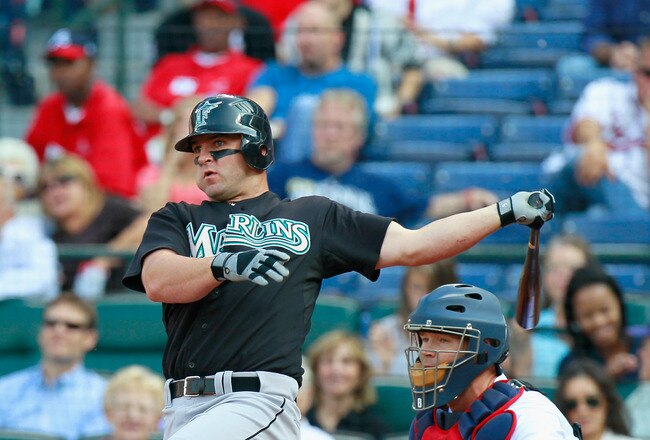 ATLANTA - SEPTEMBER 29:  Dan Uggla #6 of the Florida Marlins against David Ross #8 of the Atlanta Braves at Turner Field on September 29, 2010 in Atlanta, Georgia.  (Photo by Kevin C. Cox/Getty Images)