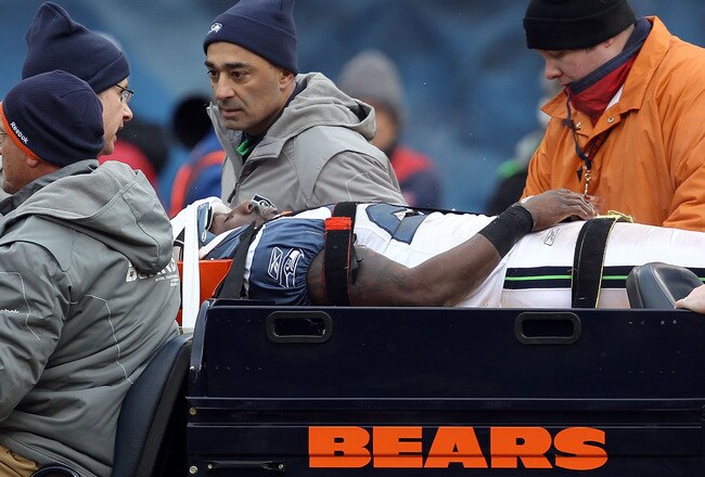CHICAGO, IL - JANUARY 16:  Marcus Trufant #23 of the Seattle Seahawks is carted off the field after an injury against the Chicago Bears in the 2011 NFC divisional playoff game at Soldier Field on January 16, 2011 in Chicago, Illinois.  (Photo by Jonathan Daniel/Getty Images)