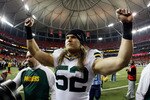 ATLANTA, GA - JANUARY 15:  Clay Matthews #52 of the Green Bay Packers celebrates as he walks off the field after the Packers won 48-21 against the Atlanta Falcons during their 2011 NFC divisional playoff game at Georgia Dome on January 15, 2011 in Atlanta, Georgia.  (Photo by Kevin C. Cox/Getty Images)