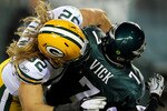 PHILADELPHIA, PA - JANUARY 09:  Clay Matthews #52 of the Green Bay Packers sacks Michael Vick #7 of the Philadelphia Eagles during the 2011 NFC wild card playoff game at Lincoln Financial Field on January 9, 2011 in Philadelphia, Pennsylvania.  (Photo by Al Bello/Getty Images)