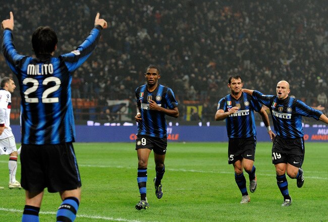 MILAN, ITALY - JANUARY 15:  Samuel Eto'o of FC Internazionale Milano celebrates scoring the third goal during the Serie A match between Inter and Bologna at Stadio Giuseppe Meazza on January 15, 2011 in Milan, Italy.  (Photo by Claudio Villa/Getty Images)