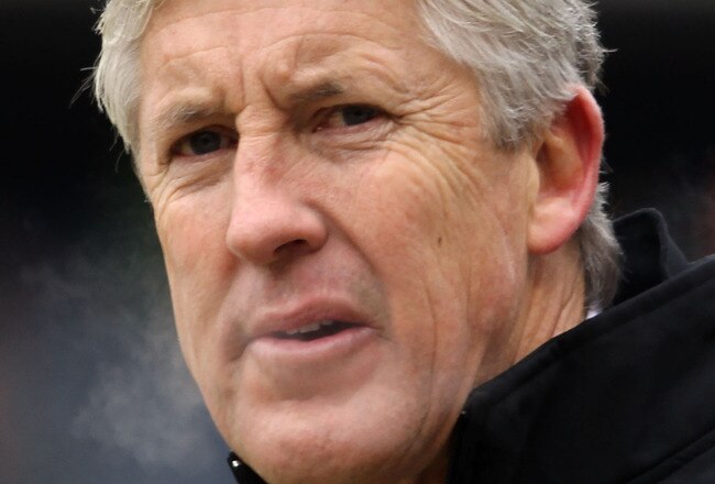 CHICAGO, IL - JANUARY 16:  Head coach Pete Carroll of the Seattle Seahawks looks on during pregame warmups before the Seahawks take on the Chicago Bears in the 2011 NFC divisional playoff game at Soldier Field on January 16, 2011 in Chicago, Illinois.  (Photo by Andy Lyons/Getty Images)