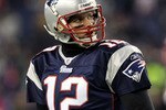 FOXBORO, MA - JANUARY 16:  Tom Brady #12 of the New England Patriots looks on near the end of their 28 to 21 loss to the New York Jets in their 2011 AFC divisional playoff game at Gillette Stadium on January 16, 2011 in Foxboro, Massachusetts.  (Photo by Elsa/Getty Images)