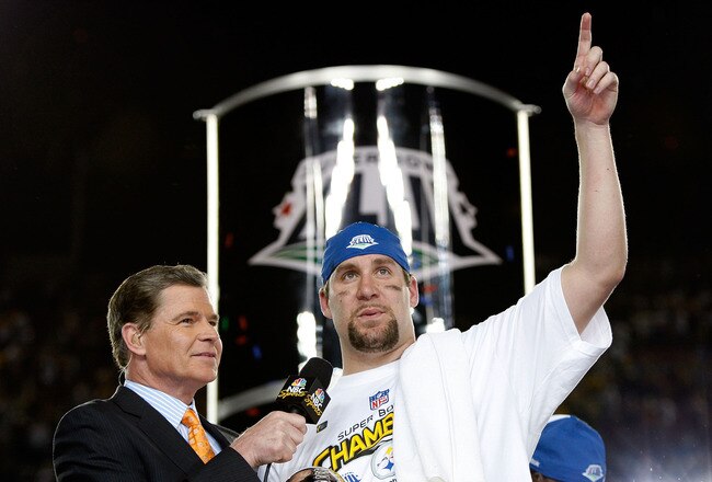 TAMPA, FL - FEBRUARY 01:  Quarterback Ben Roethlisberger #7 of the Pittsburgh Steelers celebrates with the Vince Lombardi trophy as he is interviewed by Dan Patrick from NBC after they won 27-23 the Arizona Cardinals during Super Bowl XLIII on February 1, 2009 at Raymond James Stadium in Tampa, Florida.  (Photo by Jamie Squire/Getty Images)