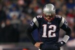 FOXBORO, MA - JANUARY 16:  Tom Brady #12 of the New England Patriots looks on near the end of their 28 to 21 loss to the New York Jets in their 2011 AFC divisional playoff game at Gillette Stadium on January 16, 2011 in Foxboro, Massachusetts.  (Photo by Elsa/Getty Images)