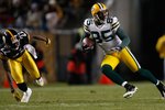 PITTSBURGH - DECEMBER 20: James Jones #85 of the Green Bay Packers runs with the ball from William Gay #22 of the Pittsburgh Steelers during the game on December 20, 2009 at Heinz Field in Pittsburgh, Pennsylvania. (Photo by Jared Wickerham/Getty Images)