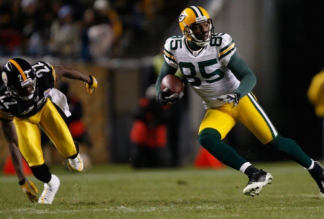 PITTSBURGH - DECEMBER 20: James Jones #85 of the Green Bay Packers runs with the ball from William Gay #22 of the Pittsburgh Steelers during the game on December 20, 2009 at Heinz Field in Pittsburgh, Pennsylvania. (Photo by Jared Wickerham/Getty Images)