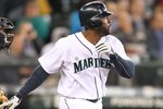 SEATTLE - MAY 26:  Milton Bradley #15 of the Seattle Mariners bats against the Detroit Tigers at Safeco Field on May 26, 2010 in Seattle, Washington. (Photo by Otto Greule Jr/Getty Images)