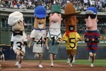 MILWAUKEE - MAY 15: The 'Racing Sausages' compete in the 6th inning of a game between the Milwaukee Brewers and the Los Angeles Dodgers on May 15, 2008 at Miller Park in Milwaukee, Wisconsin. The Dodgers defeated the Brewers 7-2. (Photo by Jonathan Daniel/Getty Images)