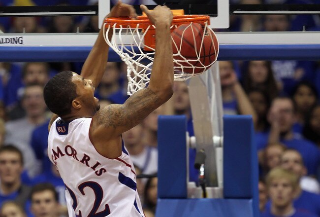 LAWRENCE, KS - JANUARY 15:  Marcus Morris #22 of the Kansas Jayhawks dunks during the game against the Nebraska Cornhuskers on January 15, 2011 at Allen Fieldhouse in Lawrence, Kansas.  (Photo by Jamie Squire/Getty Images)
