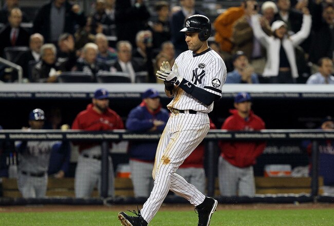 NEW YORK - OCTOBER 19:  Derek Jeter #2 of the New York Yankees celebrates after scoring in the third inning against the Texas Rangers in Game Four of the ALCS during the 2010 MLB Playoffs at Yankee Stadium on October 19, 2010 in the Bronx borough of New York City.  (Photo by Jim McIsaac/Getty Images)