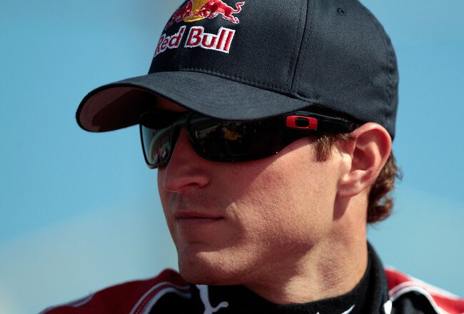 HOMESTEAD, FL - NOVEMBER 21:  Kasey Kahne, driver of the #83 Red Bull Toyota, looks on prior to the NASCAR Sprint Cup Series Ford 400 at Homestead-Miami Speedway on November 21, 2010 in Homestead, Florida.  (Photo by Chris Graythen/Getty Images)