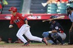 ANAHEIM, CA - JULY 11:  U.S. Futures All-Star Mike Trout #20 of the Los Angeles Angels of Anaheim doubles in the 8th inning during the 2010 XM All-Star Futures Game at Angel Stadium of Anaheim on July 11, 2010 in Anaheim, California.  (Photo by Stephen Dunn/Getty Images)