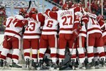 DETROIT - APRIL 10:  The Wisconsin Badgers huddle around their goalie before the game against the Boston College Eagles during the championship game of the 2010 NCAA Frozen Four on April 10, 2010 at Ford Field in Detroit, Michigan.  (Photo by Elsa/Getty Images)