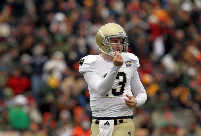 EL PASO, TX - DECEMBER 30:  Quarterback Tommy Rees #13 of the Notre Dame Fighting Irish celebrates a touchdown against the Miami Hurricanes at Sun Bowl on December 30, 2010 in El Paso, Texas.  (Photo by Ronald Martinez/Getty Images)