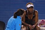 MELBOURNE, AUSTRALIA - JANUARY 21:  Venus Williams of the United States of America receives medical attention in her third round match against Andrea Petkovic of Germany during day five of the 2011 Australian Open at Melbourne Park on January 21, 2011 in Melbourne, Australia.  (Photo by Mark Kolbe/Getty Images)