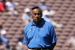 PASADENA, CA - SEPTEMBER 20:  Offensive Coordinatorm Norm Chow of the UCLA Bruins watches warm ups before the college football game against the Arizona Wildcats at the Rose Bowl on September 13, 2008 in Pasadena, California. The Wildcats defeated the Bruins 31-10.  (Photo by Christian Petersen/Getty Images)