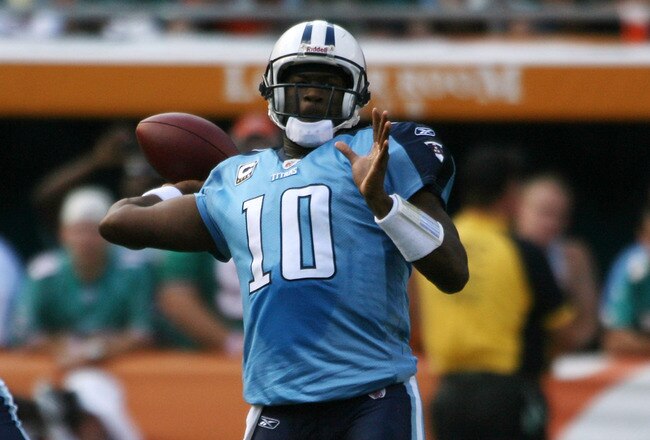 MIAMI - NOVEMBER 14:  Quarterback Vince Young #10 of the Tennessee Titans throws against the Miami Dolphins at Sun Life Stadium on November 14, 2010 in Miami, Florida.  (Photo by Marc Serota/Getty Images)