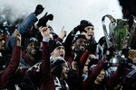 TORONTO, ON - NOVEMBER 21:  Kosuke Kimura #27 of the Colorado Rapids holds the Philip F. Anschutz Trophy and celebrates with teammates after their 2-1 overtime victory against FC Dallas during the 2010 MLS Cup match at BMO Field on November 21, 2010 in Toronto, Canada.  (Photo by Abelimages/Getty Images)