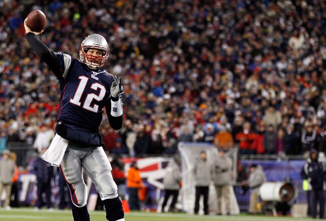 FOXBORO, MA - JANUARY 16:  Tom Brady #12 of the New England Patriots throws the ball against the New York Jets during their 2011 AFC divisional playoff game at Gillette Stadium on January 16, 2011 in Foxboro, Massachusetts.  (Photo by Jim Rogash/Getty Images)