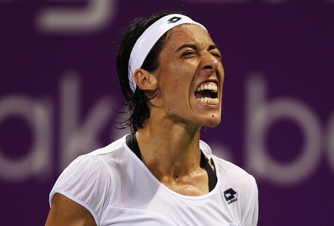 DOHA, QATAR - OCTOBER 26:  Francesca Schiavone of Italy reacts during her match with Samantha Stosur of Australia on day one of the WTA Championships at the Khalifa Tennis Complex on October 26, 2010 in Doha, Qatar.  (Photo by Bryn Lennon/Getty Images)