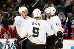 MONTREAL, CANADA - JANUARY 22:  Cam Fowler #4 of the Anaheim Ducks celebrates his first period goal with teammates Bobby Ryan #9 and Corey Perry #10 during the NHL game against the Montreal Canadiens at the Bell Centre on January 22, 2011 in Montreal, Quebec, Canada.  (Photo by Richard Wolowicz/Getty Images)