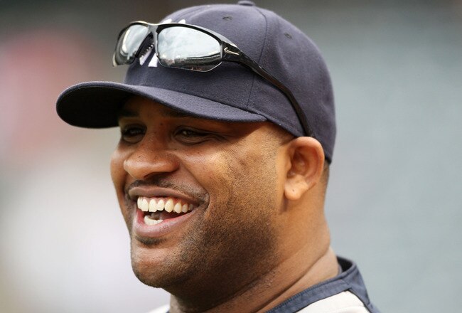 ARLINGTON, TX - OCTOBER 22:  CC Sabathia #52 of the New York Yankees looks on during batting practice prior to playing the Texas Rangers in Game Six of the ALCS during the 2010 MLB Playoffs at Rangers Ballpark in Arlington on October 22, 2010 in Arlington, Texas.  (Photo by Elsa/Getty Images)