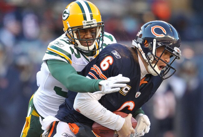 CHICAGO, IL - JANUARY 23:  Sam Shields #37 of the Green Bay Packers sacks quarterback Jay Cutler #6 of the Chicago Bears in the second quarter in the NFC Championship Game at Soldier Field on January 23, 2011 in Chicago, Illinois.  (Photo by Andy Lyons/Getty Images)