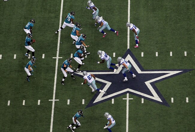 ARLINGTON, TX - OCTOBER 31:  Quarterback David Garrad #9 of the Jacksonville Jaguars drops back to pass against the Dallas Cowboys defense at Cowboys Stadium on October 31, 2010 in Arlington, Texas.  (Photo by Ronald Martinez/Getty Images)