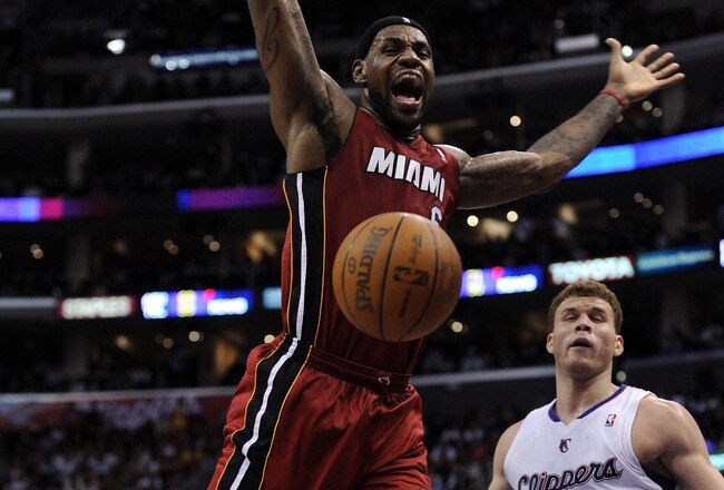 LOS ANGELES, CA - JANUARY 12:  LeBron James #6 of the Miami Heat is fouled by Blake Griffin #32 of the Los Angeles Clippers during a 111-105 Clipper win at the Staples Center on January 12, 2011 in Los Angeles, California.  NOTE TO USER: User expressly acknowledges and agrees that, by downloading and or using this photograph, User is consenting to the terms and conditions of the Getty Images License Agreement.  (Photo by Harry How/Getty Images)
