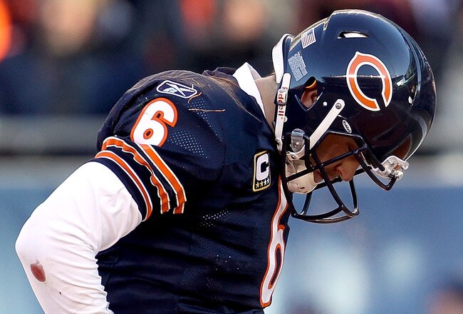 CHICAGO, IL - JANUARY 23:  Quarterback Jay Cutler #6 of the Chicago Bears reacts in the second quarter against the Green Bay Packers in the NFC Championship Game at Soldier Field on January 23, 2011 in Chicago, Illinois.  (Photo by Jonathan Daniel/Getty Images)