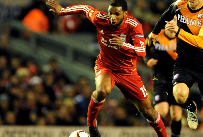 LIVERPOOL, ENGLAND - DECEMBER 15:  Ryan Babel of Liverpool is pursued by Michael Silberbauer of FC Utrecht during the UEFA Europa League Group K match between Liverpool and FC Utrecht at Anfield on December 15, 2010 in Liverpool, England.  (Photo by Clint Hughes/Getty Images)