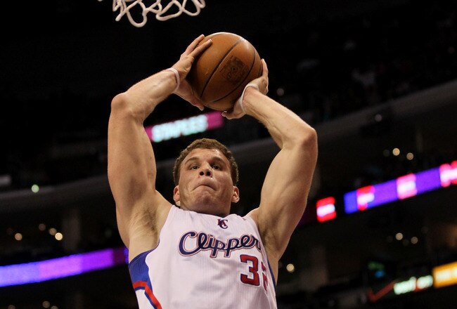 LOS ANGELES, CA - JANUARY 05:  Blake Griffin #32 of the Los Angeles Clippers grabs a rebound against the Denver Nuggets at Staples Center on January 5, 2011  in Los Angeles, California. The Clippers won 106-93.  NOTE TO USER: User expressly acknowledges and agrees that, by downloading and or using this photograph, User is consenting to the terms and conditions of the Getty Images License Agreement.  (Photo by Stephen Dunn/Getty Images)