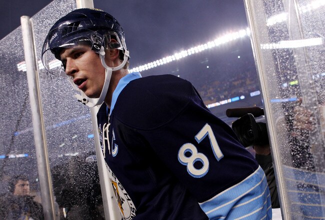 PITTSBURGH, PA - JANUARY 01:  Sidney Crosby #87 of the Pittsburgh Penguins walks off the ice after being defeated 3-1 by the Washington Capitals during the 2011 NHL Bridgestone Winter Classic at Heinz Field on January 1, 2011 in Pittsburgh, Pennsylvania.  (Photo by Jamie Squire/Getty Images)