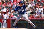 ANAHEIM, CA - AUGUST 11:  Zack Greinke #23 of the Kansas City Royals pitches against the Los Angeles Angels of Anaheim at Angel Stadium on August 11, 2010 in Anaheim, California.  (Photo by Jeff Gross/Getty Images)