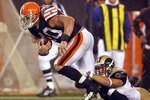 CLEVELAND - AUGUST 21:  Chris Chamberlain #57 of the St. Louis Rams tackles Peyton Hillis #40 of the Cleveland Browns at Cleveland Browns Stadium on August 21, 2010 in Cleveland, Ohio.  (Photo by Matt Sullivan/Getty Images)