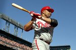 SAN FRANCISCO - OCTOBER 19:  Placido Polanco #27 of the Philadelphia Phillies stands on deck against the San Francisco Giants in Game Three of the NLCS during the 2010 MLB Playoffs at AT&T Park on October 19, 2010 in San Francisco, California.  (Photo by Ezra Shaw/Getty Images)